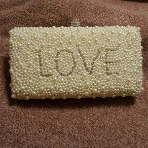 Pearl covered LOVE clutch